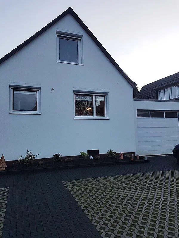 Energetische Sanierung Einfamilienhaus (WDVS) & Garagenneubau